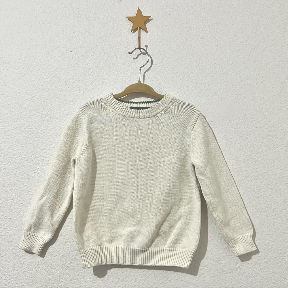 White knitted sweater